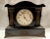 This listing is for an antique black mantel clock. This one is the "Home" model by Waterbury. This clock features ornate...