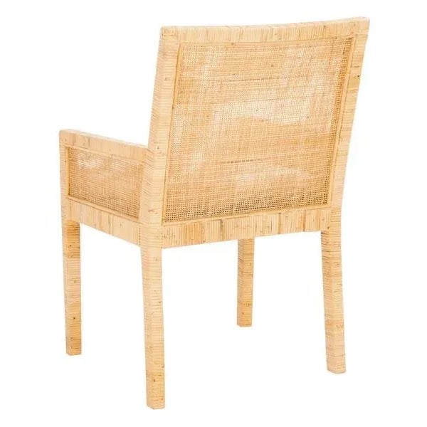 An icon of seaside style, this Sarai Accent Chair gives any décor a breath of tropical fresh air. Sarai’s natural cane...