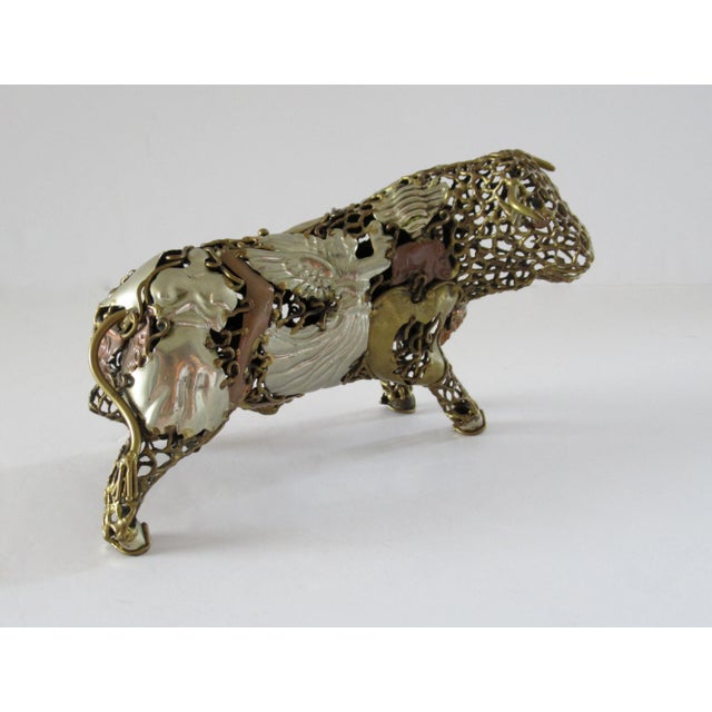 Juxtaposed metals and handcrafted symbols create this original Mid Century Modern Pal Kepenyes style sculpture. Perfectly...