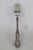 This lovely Dinner Fork is made out of metal and silver plated. It features a lovely floral scrollwork motif on the handle...