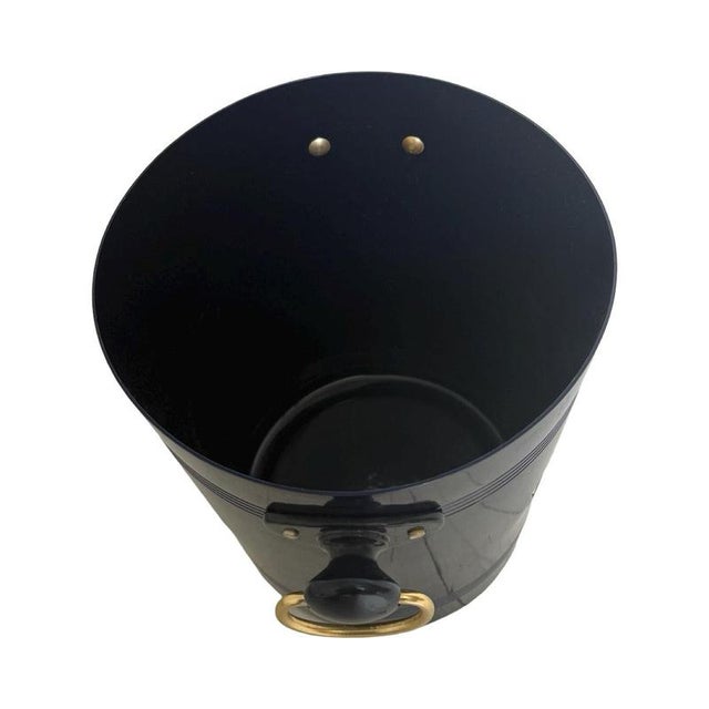 Champagne cooler or ice bucket made for Jeanmaire Champagne. Blank metal with a dark blue coating, embossed with their...