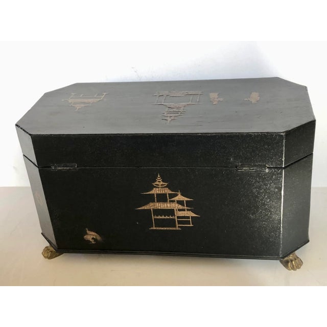 When this tea caddy was made tea was so valuable that it was kept under lock and key. This beautiful example of an English...