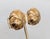 1980s round domed goldtone "knot" design clip earrings. Marked "CINER®" on the clips and "CINER©" on the section that the...