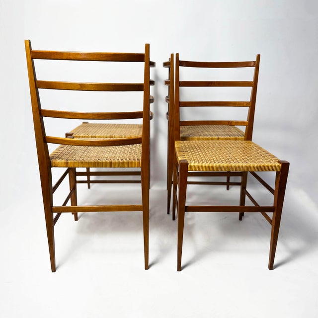 Set of four beautifully elegant vintage Italian ladder-back chairs, 1950s–60s, in the style of Gio Ponti’s Superleggera....