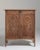 A richly carved walnut buffet reflecting the continuation of traditional French craftsmanship into the mid-20th century,...