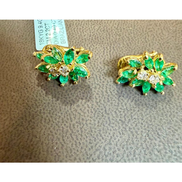 2.2Ct Natural Brazilin Marquise Emerald & 0.40 Ct Diamond Clip on Earring 18 Karat Yellow Gold This exquisite pair of...