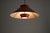 Sleek pendant light dates from the 1970s, that embodies the functional elegance of Scandinavian Modern design. The fixture...