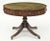 Regency period mahogany revolving drum table with olive green gilt-tooled leather top, the frieze fitted with alternating...