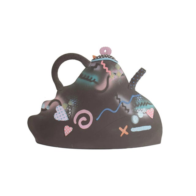 A Postmodern studio pottery teapot sculpture by the American artist Madeline Kaczmarczyk. This ceramic sculpture of a...
