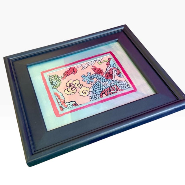 Meet Dragon—a colorful, one-of-a-kind piece of upcycled wall art featuring Schumacher’s whimsical Magic Mountain Dragon...