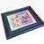 Meet Dragon—a colorful, one-of-a-kind piece of upcycled wall art featuring Schumacher’s whimsical Magic Mountain Dragon...
