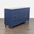 This Room & Board dresser features a sleek navy finish and modern design. It has 10 spacious drawers that glide smoothly,...