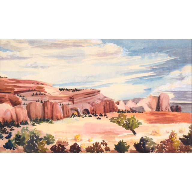 Dramatic desert landscape by Betty Jenkins (American, 20th Century). Red rock formations stretch across the center of the...