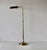 Fredrick Cooper style, minimal and versatile brass pharmacy floor lamp. Elegant shade pivots and rotates. The height can...