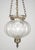 Antique original hand blown clear crystal onion shaped bell jar pendant light with brass hardware. The chain is made of...