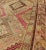 Early 20th Century Antique Khotan Rug With Paired Diamond Medallions in Wine Red For Sale In Atlanta - Image 6 of 8