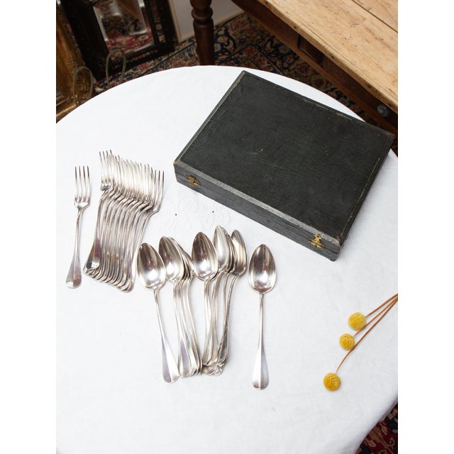 Mid-20th century silver-plated metal cutlery set for appetizers or desserts by the French firm LUX. Its elegant,...