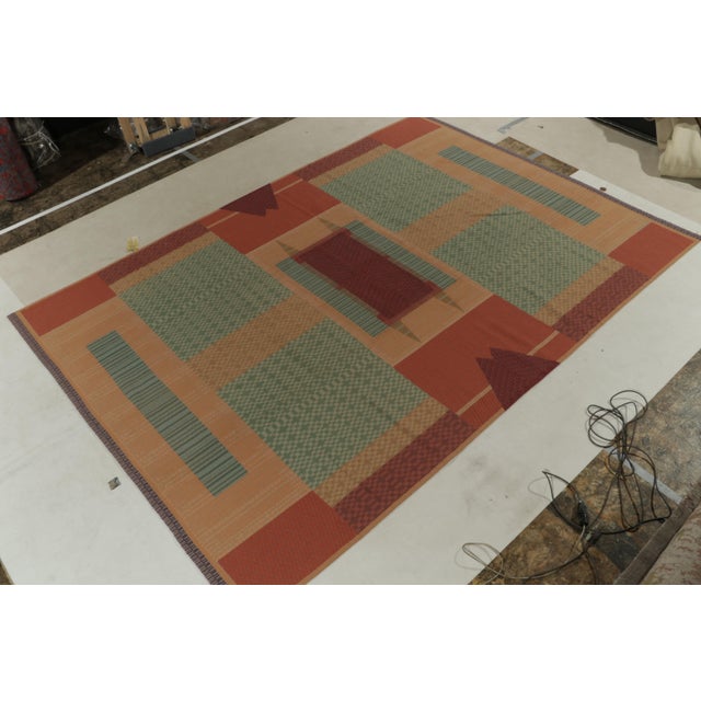 Among the works of Rug & Kilim in collaboration with revered colleague Teddy Sumner, an all-wool needlepoint handmade...