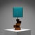 This sculptural table lamp exemplifies the architectural approach to form that characterized much of French decorative...
