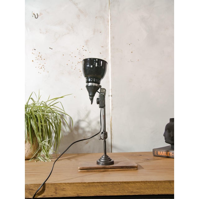 This original Rademacher desk lamp is a striking example of early-to-mid 20th century industrial design. Crafted in...