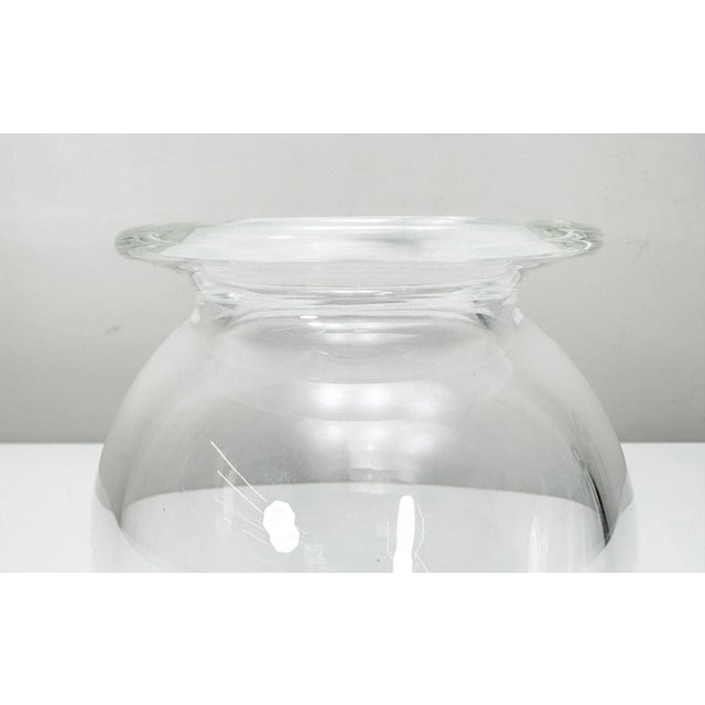 A timeless Steuben crystal vase showcasing the brand’s signature clarity and refined minimalist form. This piece features...