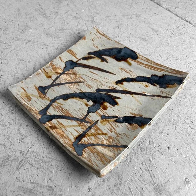 Beautiful Japanese artisanal ceramic bowl with raised corners from the 1980s. The top of the earthenware is glazed in...