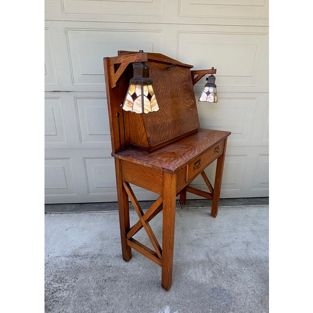 DESCRIPTION: Vintage antique Mission Oak Arts & Crafts era drop down desk secretary with and unusual pair of custom/...