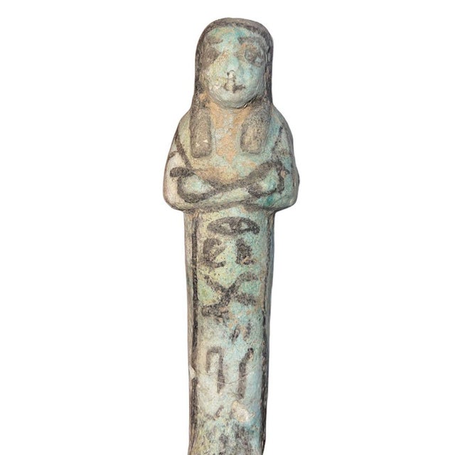 A finely preserved Ancient Egyptian faience ushabti figure dating to the New Kingdom, 19th Dynasty, circa 1293–1185 B.C....