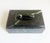 A sculptural green marble lidded box featuring dramatic veining in deep green and soft white tones. Crafted from solid...
