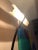 Super chic Italian bronze patina elongated wall sconce having sinuous silhouette and frosted glass horizontal shade at the...