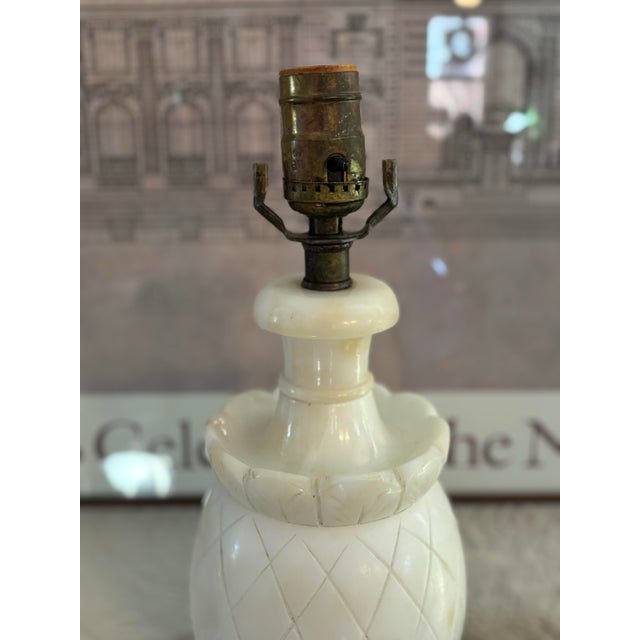 Neoclassical alabaster pineapple form lamp with shade. Nicely cut design and some grey veining in the ivory alabaster....