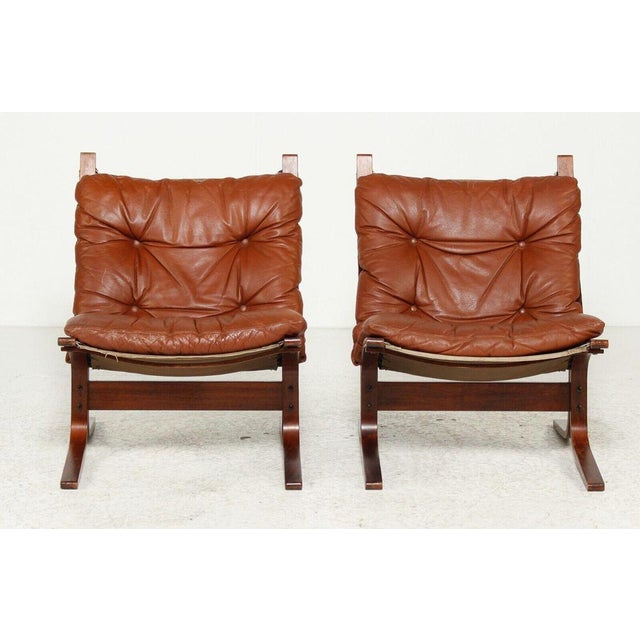 Made in Norway by Westnova, designed by Ingmar Relling, model "Siesta", a beautiful set of lounge chairs comprising of a...