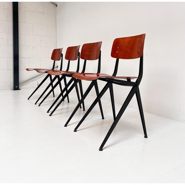 This is the Model S102 (without armrests) chair by Ynske Kooistra for Markro Holland. These chairs are also called school...