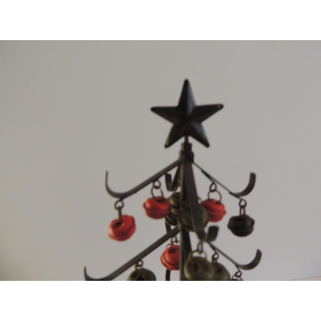 Vintage Arts and crafts style Metal Christmas tree with Painted tissabells ornaments Red sand Black Size: 6D x 12H