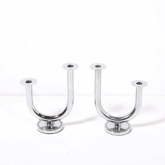 This stunning pair of "Taurex" candlestick holders, designed by Walter Von Nessen for the Chase Brass & Copper Company,...