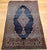 "This exquisite vintage Persian Kashan rug, hand-knotted in the early 1900s, showcases the meticulous artistry and...