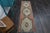 Vintage Hand-Knotted runner rug is a semi-antique vintage runner rug. The '70s Eastern region of Anatolia's unique rug is...