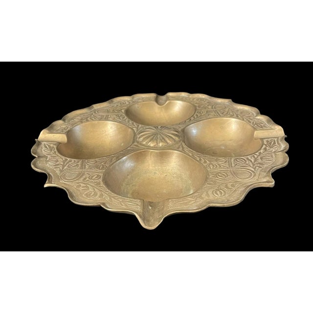This antique Indonesian brass cake mold is a stunning piece of art from Southeast Asia. Crafted between 1900-1940, it...