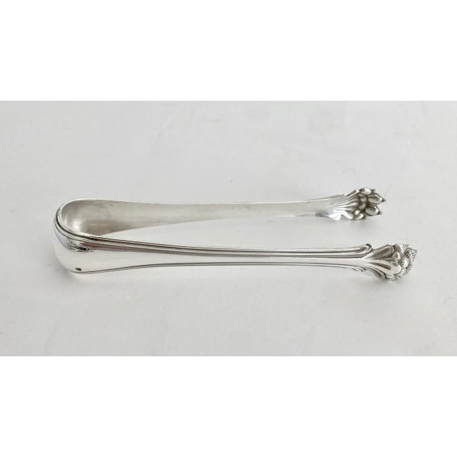 These French silverplate tongs with very detailed claw grips are marked and date to 1880s Christofle. While they were...