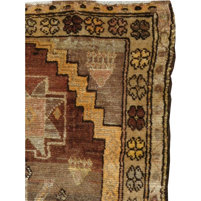 A vintage Turkish Anatolian rug from the mid-20th century. Measures: 2' 7" x 3' 5"