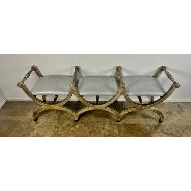 Unique 3-part Neoclassical style "X" bench in a silvered finish. It is actually one bench but there are three separate...