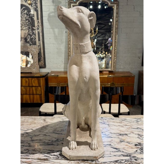 Antique Italian whitewashed terracotta whippet. Italian craftsmanship with whimsical elegance—whitewashed terracotta...