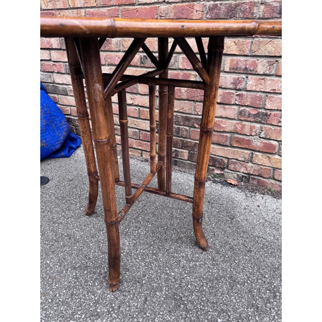 This is a beautiful 19th century English bamboo side table! Tables like these make excellent accent pieces because their...