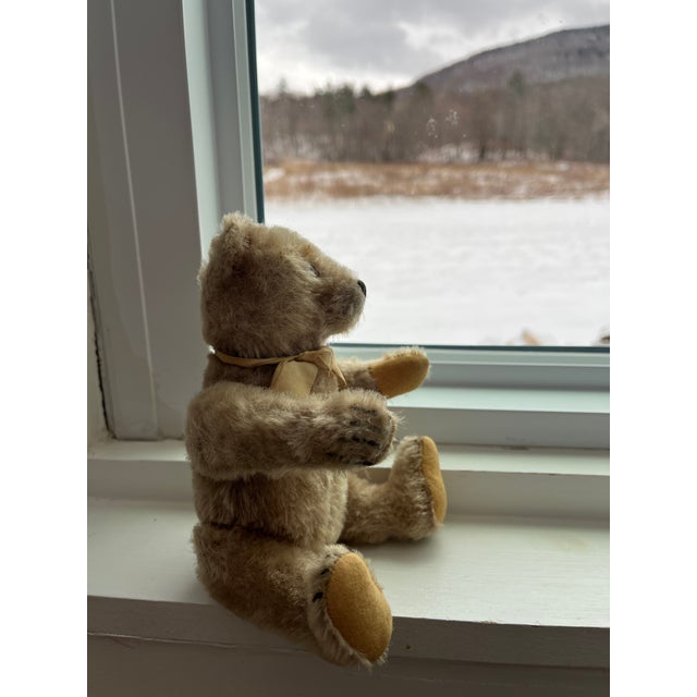 adorable mini antique bear in excellent condition, blonde mohair. high end handmade quality, legs and arms swing,...