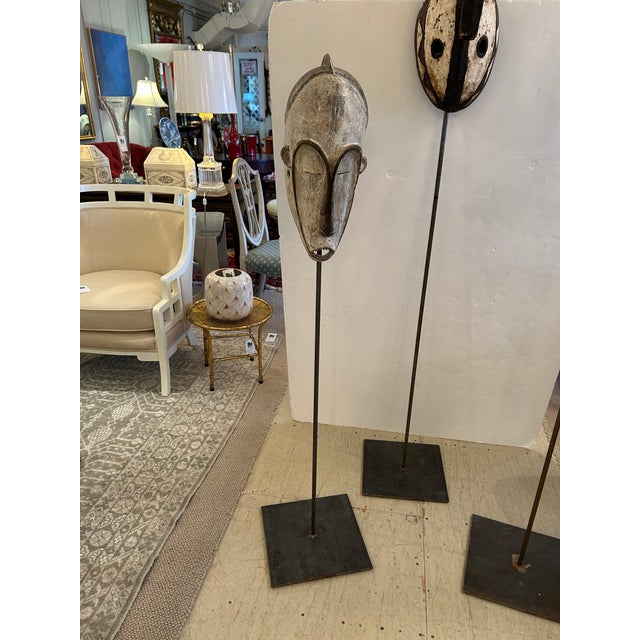 African Collection of African Carved Wood Masks on Tall Custom Iron Stands For Sale - Image 3 of 16