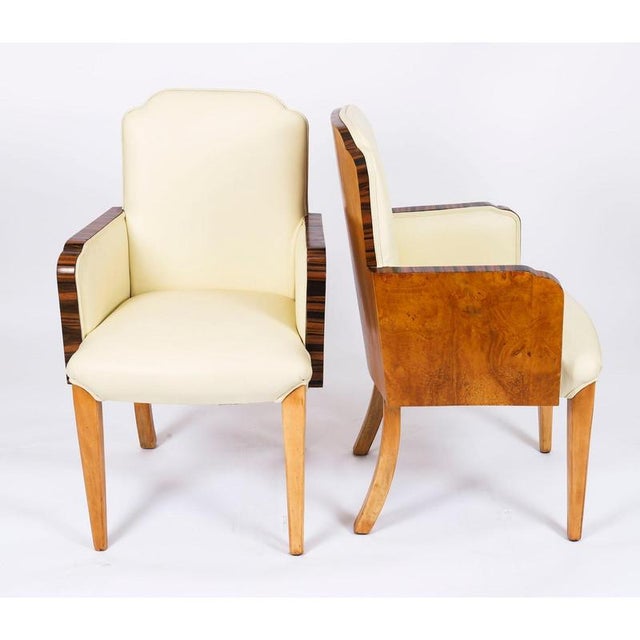 A superb set of eight antique Art Deco burr walnut and coromandel dining chairs attributed to the world renowned cabinet...