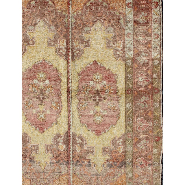 Vintage Oushak Rug With Two Medallion Panels in Yellow, Brown, Orange and Soft Red For Sale - Image 4 of 6
