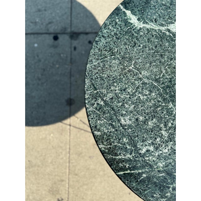 A blend of modern and vintage. This custom made contemporary accent table is beautiful from all angles. A thin metal wired...