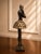 Graceful and sophisticated, this authentic Uttermost bronze finish ballerina sculpture brings timeless elegance to any...
