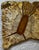 A striking monumental three-panel wall sculpture titled “Smokey Moon Shelter” by R. Earnhart, signed and dated 1993 on the...